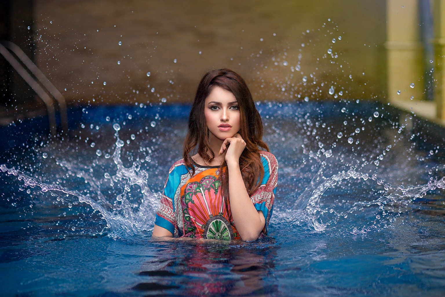 Editorial portrait with water splash